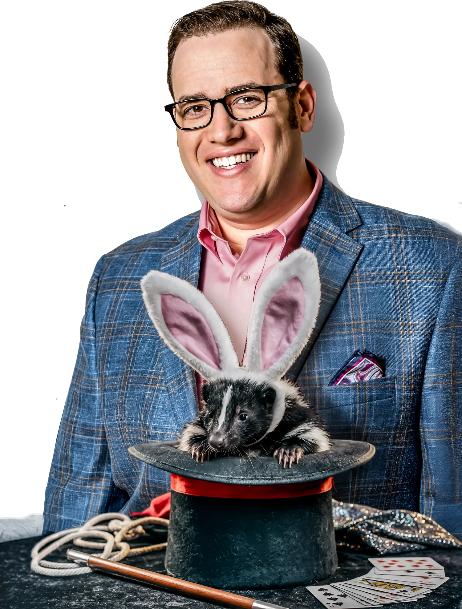 Scott Green with a skunk wearing bunny ears in a top hat